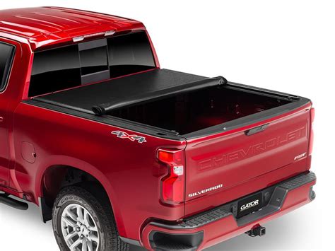 Both covers are equally secured from thieves. . Gator srx roll up tonneau cover
